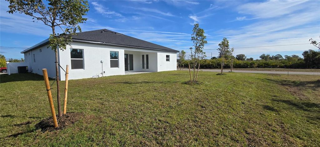 Photo of 203 Wright Drive, Rotonda West, FL 33947 (MLS # C7520607)