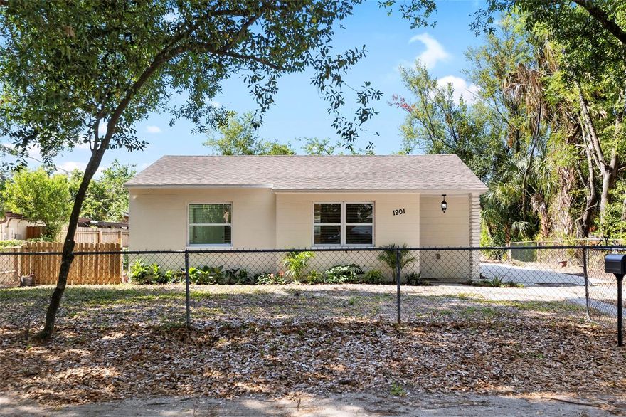 One or more photo(s) has been virtually staged. Block Home with no flood insurance required! This 2 bedroom 2 bath home is a solidly constructed home located in a centrally located neighborhood close to I-275, Seminole Heights, near Downtown Tampa and Ybor City.  The home comes fully equipped with all appliances, including a brand-new stainless steel dishwasher, stainless steel bottom-freezer refrigerator, range microwave, and a full-size washer and dryer—making it truly move-in ready. Double-pane windows, installed by the previous owners, enhance both durability and energy efficiency. The roof and ac were replaced in 2017 and both in good condition.  Completely fenced, this yard is the perfect spot for Spot to call home, too.  Affordable, well-built, and conveniently located near everything Tampa has to offer—this home is a must-see!