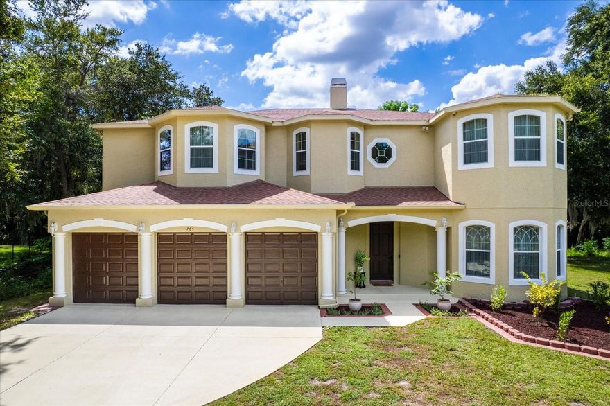 Welcome home to this enchanting hidden gem, tucked away within the quiet streets of exclusive Safety Harbor! This peaceful and private retreat boasts 79’ of frontage to a conservation area! Considering the space and privacy, and being free of HOA restrictions, this is your chance to bring your boats, car collection, and other toys to your personal sanctuary. This magnificent and pristine home with a recent passing 4-point inspection, was built with strength, and eloquent precision in mind, producing a functional and open layout, soaring 21' ceilings in the great room, high-caliber craftsmanship, dual-sided fireplace, and expansive kitchen, to the not-so-visible features, such as two 4-ton HVAC systems replaced in 2021, has been maintained to reduce allergens by remaining pet and smoke free, Icynene insulation throughout which significantly reduces energy costs, built to withstand a minimum of Cat 3 force hurricane winds and no flood insurance required, aluminum shutters available, a command center for all your security needs, and two 60-gallon hot-water heaters connected in series (totaling 120 gallons) to meet any ample hot water demand throughout the house. Other notable features include a formal dining room with large bay windows, new 2023 built-in dual ovens, beautiful hardwood cabinetry, granite countertops, 3 wine coolers in the dry bar, large butler's pantry, gorgeous views from the balcony walkways, a bonus room on the first level with nearby half bath, with the option to use as an office/den/or 5th bedroom, large laundry room, and walk-in closets in every room. Upstairs, the split plan features the owner's suite and additional master suite on the north end of the home, and two large bedrooms with a guest bathroom on the south end of the home. The owner's suite features, private balcony access, private access to a spiral staircase leading to the kitchen area in case that midnight snack calls to you, a grand ensuite bathroom with a garden tub, private facilities, a large walk-in shower with dual shower heads, immense walk-in closet and dual sink vanity. The second master or guest suite, offers a private bathroom, large bay windows, and a walk-in closet. The exterior of the home is ready for you to make it your perfect oasis or perhaps, add on additional living space, and/or extra storage, you could even leave it open for large gatherings, the possibilities are endless! This tranquil residence rests at the end of Elm Street so there is no concern for noisy traffic. Talk about location, 5 minutes to the famous Main Street, 7 minutes to Philippe Park, 7 minutes to Gulf to Bay, and 7 minutes to Countryside. Residing in this fantastic city gives you the small-town feel and convenience of big city living in under 10 minutes in any direction! Safety Harbor has so much to offer from picturesque waterfront walks on Bayshore Dr, a marina and pier, fine dining, and spas! This is also a fantastic community for families, featuring several top-rated schools, including Espiritu Santo, Safety Harbor Elementary, and many more! Painting the picture of what this home has to offer in words is by no means enough, it must be seen to truly capture the essence of living in Safety Harbor's Elm Street, but do not delay, an opportunity such as this, does not come around every day.