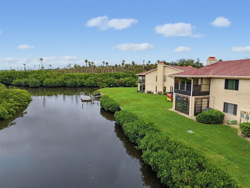 Photo of 9950 Eagles Point Circle #2, Port Richey, FL 34668 (MLS # W7888042)