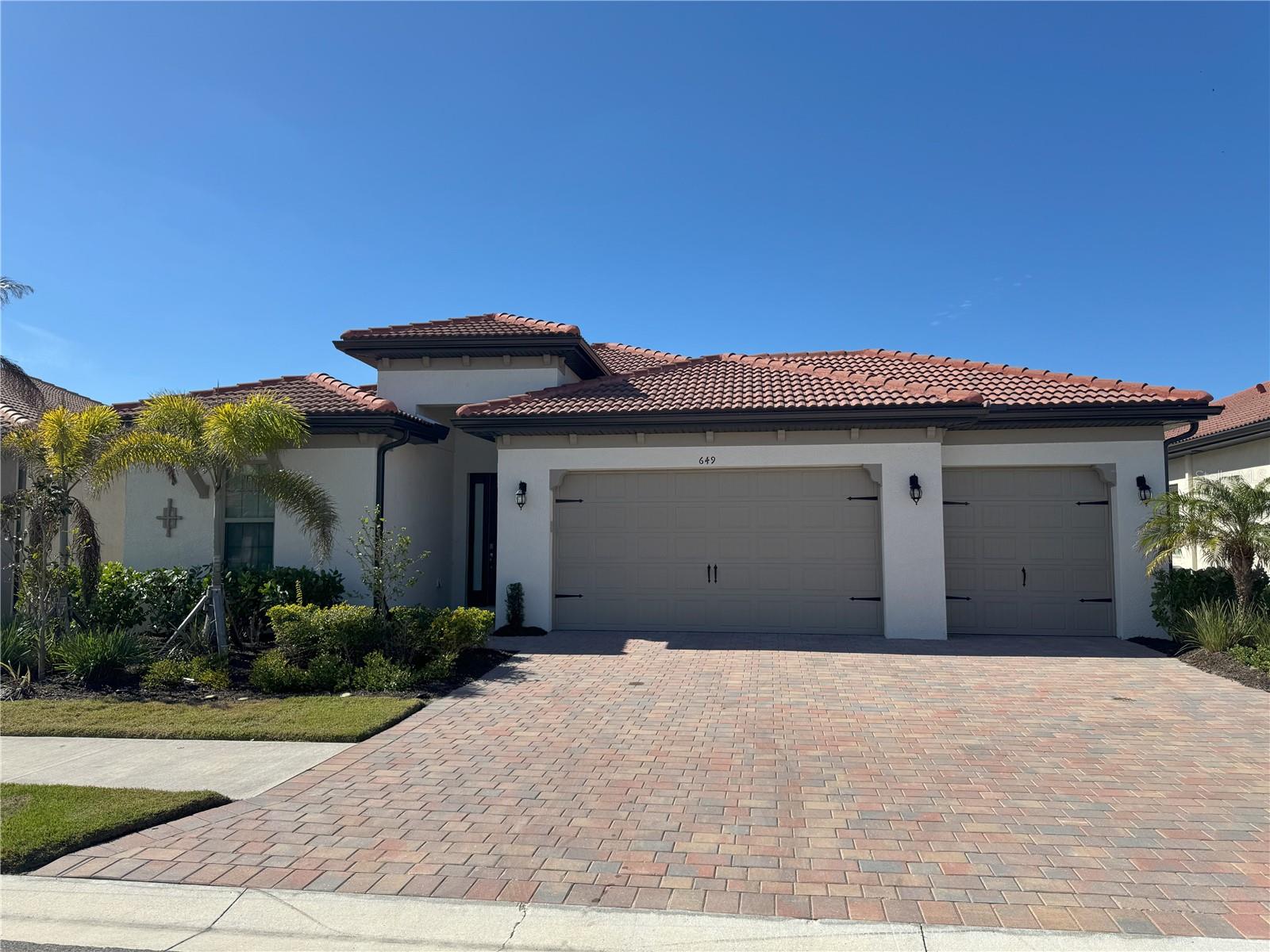 PRICED TO SELL! LOCATION, LOCATION, LOCATION. This stunning single family residence with water view, situated within the resort-style community of Toscana Isles, is an exceptional property that features an open floor plan with a generous layout, comprising three bedrooms, two full bathrooms, two half bathrooms, and a den/study room with French doors, and a supersized, roomy and upgraded 3.5-car garage with epoxy flooring, ensuring ample space for both comfortable living and entertaining.
Upon entering through the front door, one is immediately enveloped by the sense of belonging in this remarkable home. This beautiful lakefront property seamlessly combines casual elegance with sophistication and style. The glistening lake draws your gaze, inviting you to unwind and appreciate the expansive lanai while enjoying the captivating water views. The nice sundeck under lanai and the spacious covered area ideal for outdoor dining, along with a dedicated bath, provide abundant space for social gatherings and entertainment.
The gourmet kitchen is a chef's delight, featuring a large center island, under-cabinet lighting, ample quartz countertops, and cabinetry with soft-close drawers, as well as a sizable walk-in pantry. The Great Room boasts a tray ceiling adorned with crown molding and a wall of sliding doors that open to the screened lanai, showcasing the stunning lake view.
The Master Suite serves as a luxurious retreat, complete with an opulent bath, a spacious walk-in closet, and picturesque lake views. Additionally, the property includes two more bedrooms and a supersized, roomy and upgraded 3.5-car garage with epoxy flooring.
Toscana Isles offers a comprehensive resort-style living experience, encompassing over a large lakefront property. Residents can partake in activities such as kayaking, canoeing, pedal boating, stand-up paddleboarding, and fishing. The Tuscan-inspired amenity center features an impressive clubhouse with a remarkable infinity-edge pool, a fitness center, a meeting room, a caterer's kitchen, a billiard room, a full-time activities director, party room and a bar. Furthermore, residents can enjoy tennis, bocce ball, a dog park, and an active pickleball schedule. Embrace the complete lifestyle that this home and the Toscana Isles community provide.
For added convenience, the new Sarasota Memorial Hospital Venice campus , beaches of Venice and Nokomis and shopping/dining of historic Venice Island are only a few minutes away. Also close to the one of best schools in Florida, Pine View School (Grade 2 to 12). And location is great, very convenient to get on/off from the I-75 highway.
Please don't miss out this unique opportunity! Start enjoying the amazing Florida resort lifestyle in Toscana Isles!