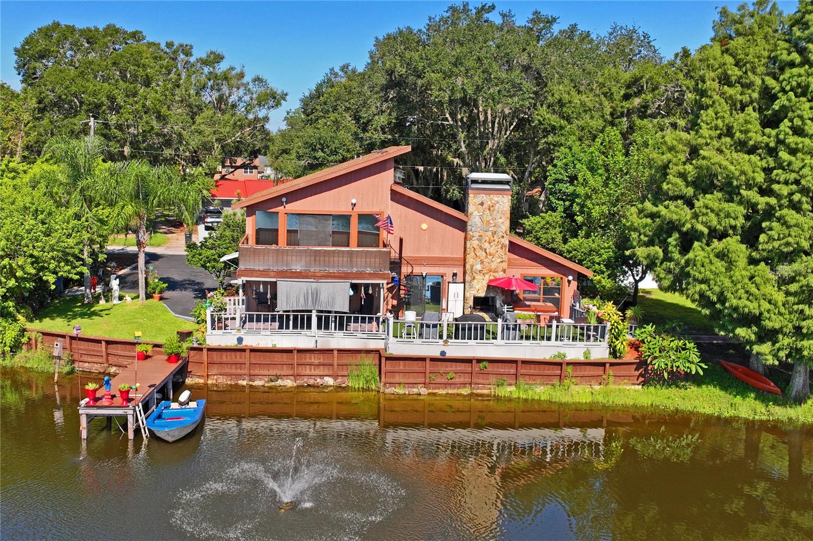 3-Bedroom Lakefront Home + Income-Producing Guest Cottage
Welcome to a home that truly has it all — a beautifully updated 3/2 main home plus a detached 1/1 guest house (973 sq. ft.) currently rented for $1,550/month, with a tenant who hopes to stay after the sale.
The main home features an updated kitchen (2023) with granite countertops and soft-close cabinets, a unique indoor-outdoor wood-burning fireplace in the living room, and an updated back porch (2023). Upstairs, the private primary suite offers two walk-in closets, dual sinks, and a versatile office/library/gym with stunning lake views.
The spacious guest house includes a full kitchen, laundry, and storage — plus a newer roof (2021) and HVAC (2017). Both homes are block construction, with main home including a roof (2018) and HVAC (2019).
Bonus: NO HOA, NO CDD, top-rated schools nearby, and easy access to I-275, shopping, and dining.
Come see this special property and imagine yourself living the lakefront lifestyle!