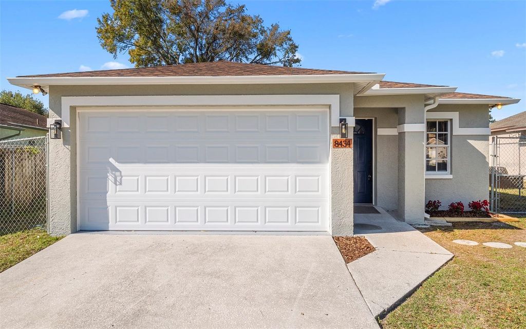 Photo of 8434 N River Dune Street, Tampa, FL 33617 (MLS # TB8462145)