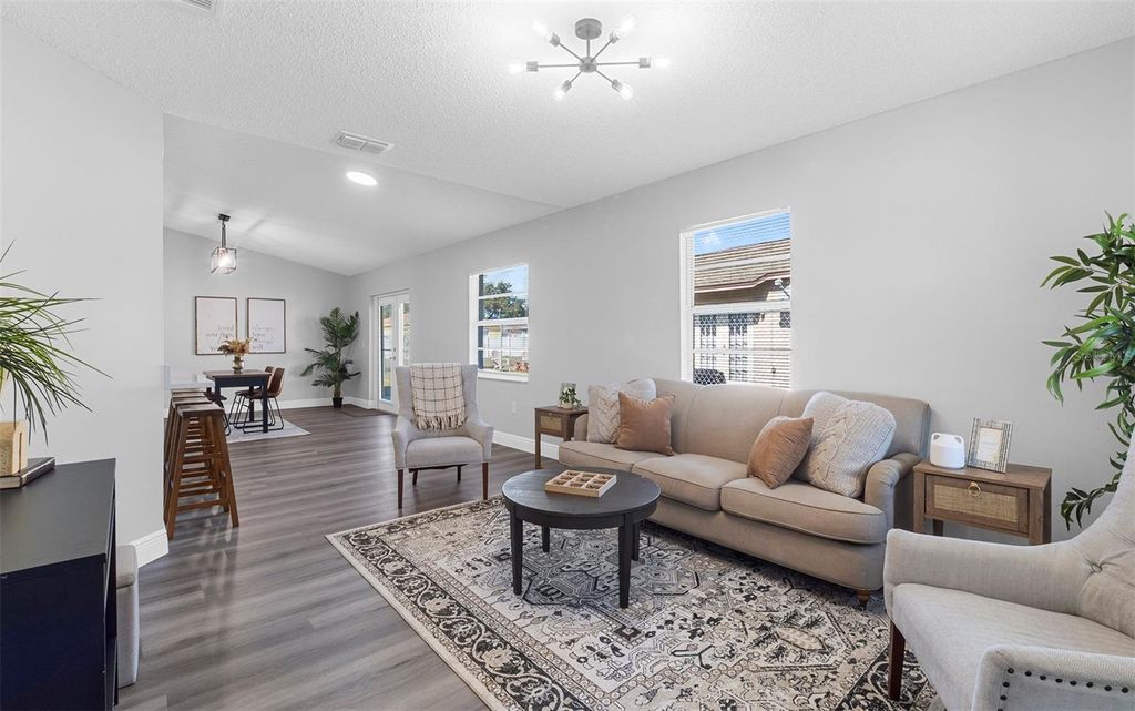 Photo of 8434 N River Dune Street, Tampa, FL 33617 (MLS # TB8462145)