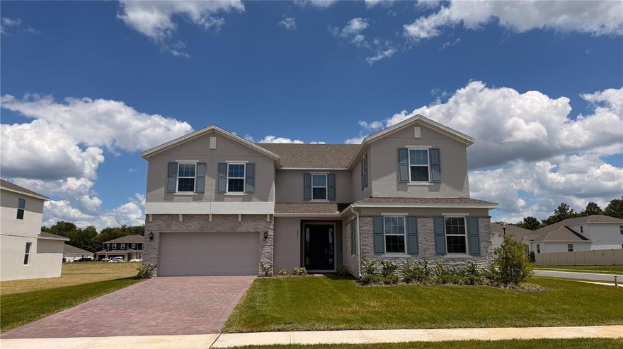 Discover our only Move-In Ready Palmer plan situated on a beautiful corner homesite and located in the highly sought after Bargrove Estates Community! This exquisite home features a total of 6 Bedrooms, 4 full Baths, 2 half-Baths, and 2 car Garage, including an attached Casita / Guest Suite featuring a large Bedroom, full Bath, and separate entrance. The 1st floor of the Palmer features a spacious Great Room overlooking a covered rear Lanai, providing great outdoor living and entertaining space. Beautiful tile flooring is featured in the 1st floor Main living areas, and window blinds are included throughout for added privacy. Extensive luxury features include 9'4" first floor ceilings, 5 1/4" baseboards throughout, 8' interior doors on 1st floor, and much more! Expansive gourmet kitchen includes upgraded 42" cabinetry, quartz countertops, sleek tile backsplash, kitchen island, and stainless appliances including built-in oven and cooktop. The 2nd Floor features a spacious Gathering / Bonus Room, great for additional entertaining space, media room, or exercise suite. The luxurious Primary suite features adjacent sitting room and an incredible en-suite Bath featuring garden tub, separate adult-height vanities, spacious dual walk-in closets, and a walk-in shower with rainhead shower fixture, wall tile surround, and frameless glass enclosure. This fantastic home is located in the quaint community of Bargrove Estates located just a few minutes from historic downtown Mount Dora. Shopping, restaurants and movie theater are all within easy access so you can enjoy the charm of living in a small community without forfeiting convenience.