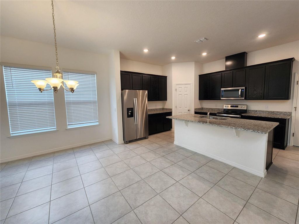 Photo of 10360 Austrina Oak Loop, Winter Garden, FL 34787 (MLS # O6383063)