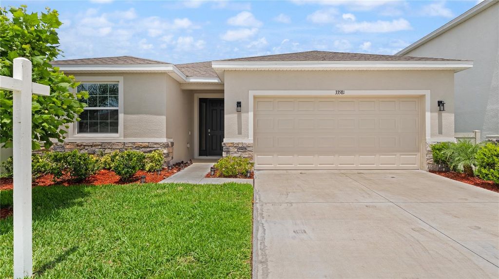 Photo of 33581 Elm Hill Branch, Wesley Chapel, FL 33545 (MLS # TB8372598)