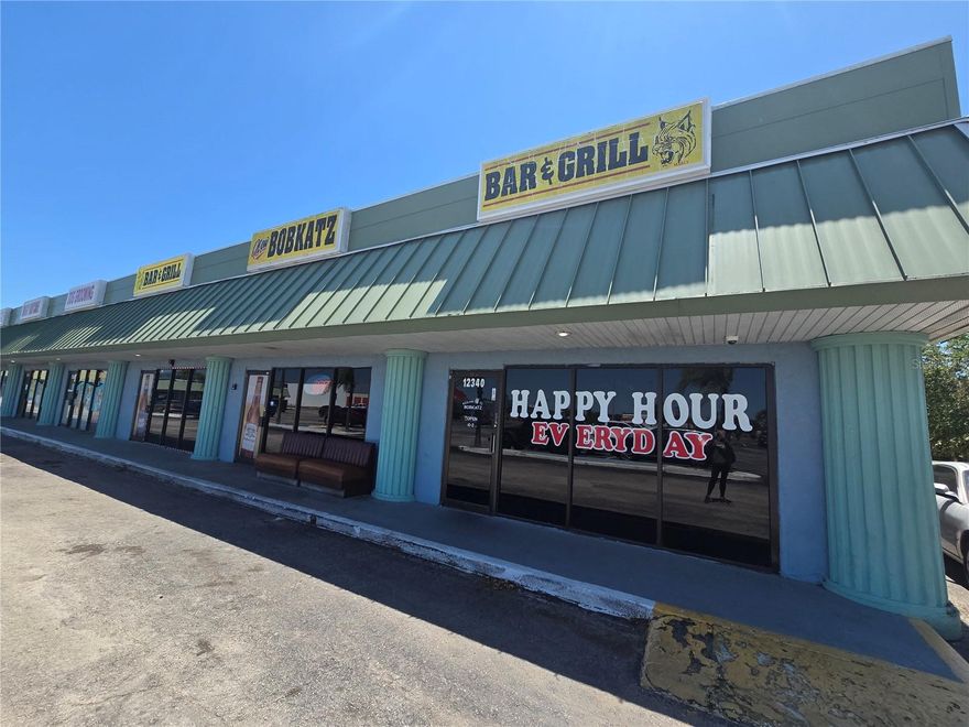 Under contract-accepting backup offers. Income Producing Property with ample parking and storage in the heart of Hudson!  Several long-term tenants, space available.