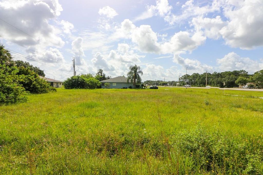 Photo of 12000 S Tamiami Lot 17 &amp;18 Trail #Front, North Port, FL 34287 (MLS # C7430063)