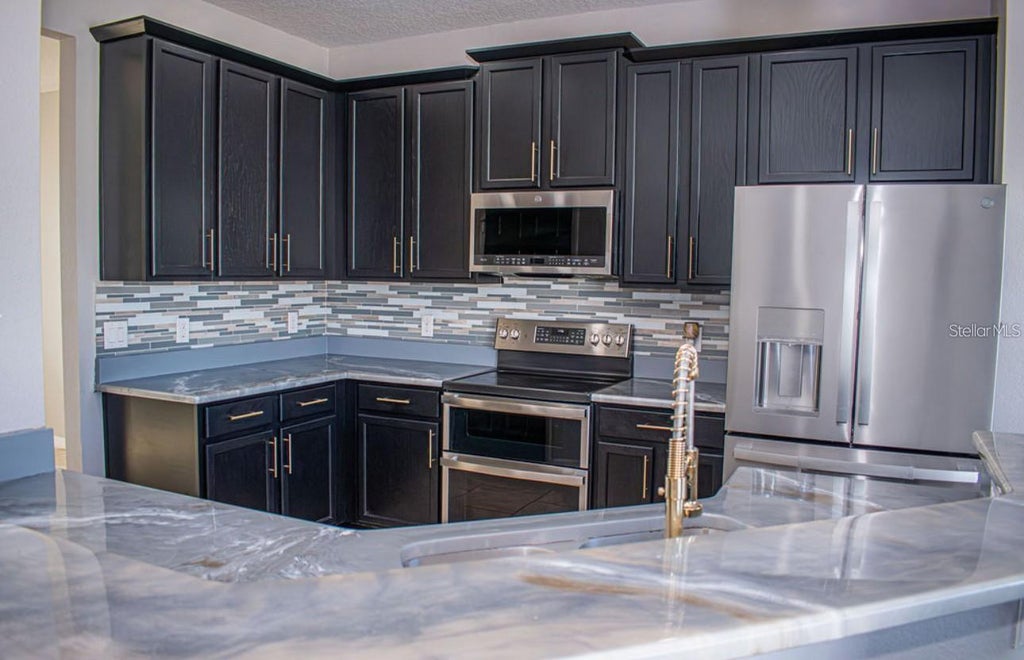 Photo of 4903 Rockvale Drive, Kissimmee, FL 34758 (MLS # S5158154)