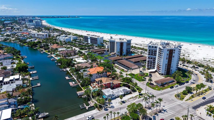 WATERFRONT and Ocean View and Canal front.  The house is located right across from Lido Beach and next to St Armand Circle.  This home will have all the views.  Price is for Land only. Property sustained flood damage.  BUILD YOUR HOUSE HERE NOW! Comes with City Approved ready to go plans to build 4568 SF Single Family Home with a Raised Pool and Deck overlooking the Gulf.  Also Roof Deck on the top floor with even better views.  Or Design your own home on this perfect site.   All Home Imagery, Floor Plans and Finishes contained within this book are not drawn to scale and are for conceptual use only, Final Details, Selections, and Finishes may very, Some features, Artistic Renderings and Options shown are for inspiration purpose.