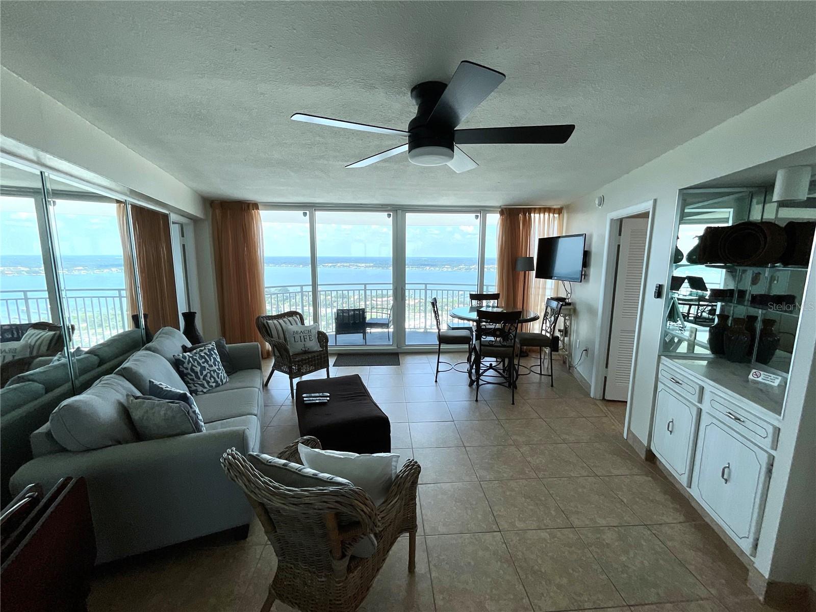Experience oceanfront living in this stylish Daytona Beach Condo, perfectly situated along the Atlantic shoreline. This sunlit unit offers an open-concept design with sleek updates, a modern kitchen with granite countertops, and a private balcony where the sea breezes set the tone for relaxed coastal living. Retreat to spacious bedrooms with beautiful views or entertain in the living area. The community boasts resort-style amenities- sparkling oceanfront pool, spa, tennis and pickleball courts, a game room, fitness center, exclusive owners clubroom, secure designated parking, the esteemed Top of Daytona Restaurant and more. This is also a prime investment opportunity with weekly rentals.