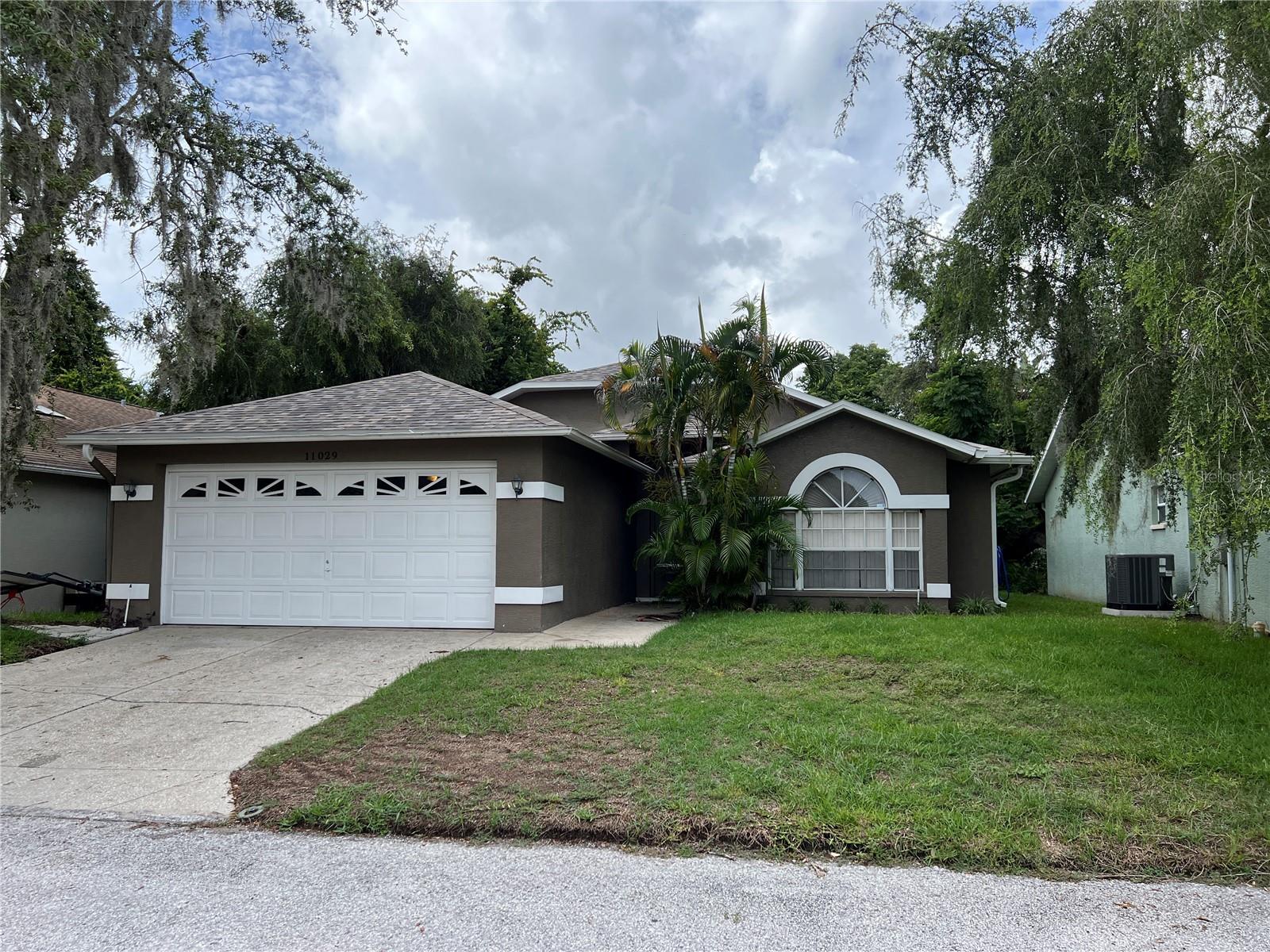 Nicely kept 3 bedroom home in River Ridge community. This home features an eat-in-kitchen with newer appliances, a dining room and spacious great room too with cathedral ceilings. There's a lanai overlooking lush landscaping. Call Laura Wiegman (727). 809-2254 to schedule a showing of this home.