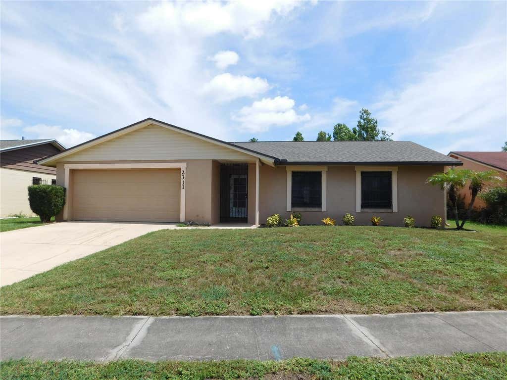 Photo of 2311 Towerbridge Street, Orlando, FL 32837 (MLS # O6418269)