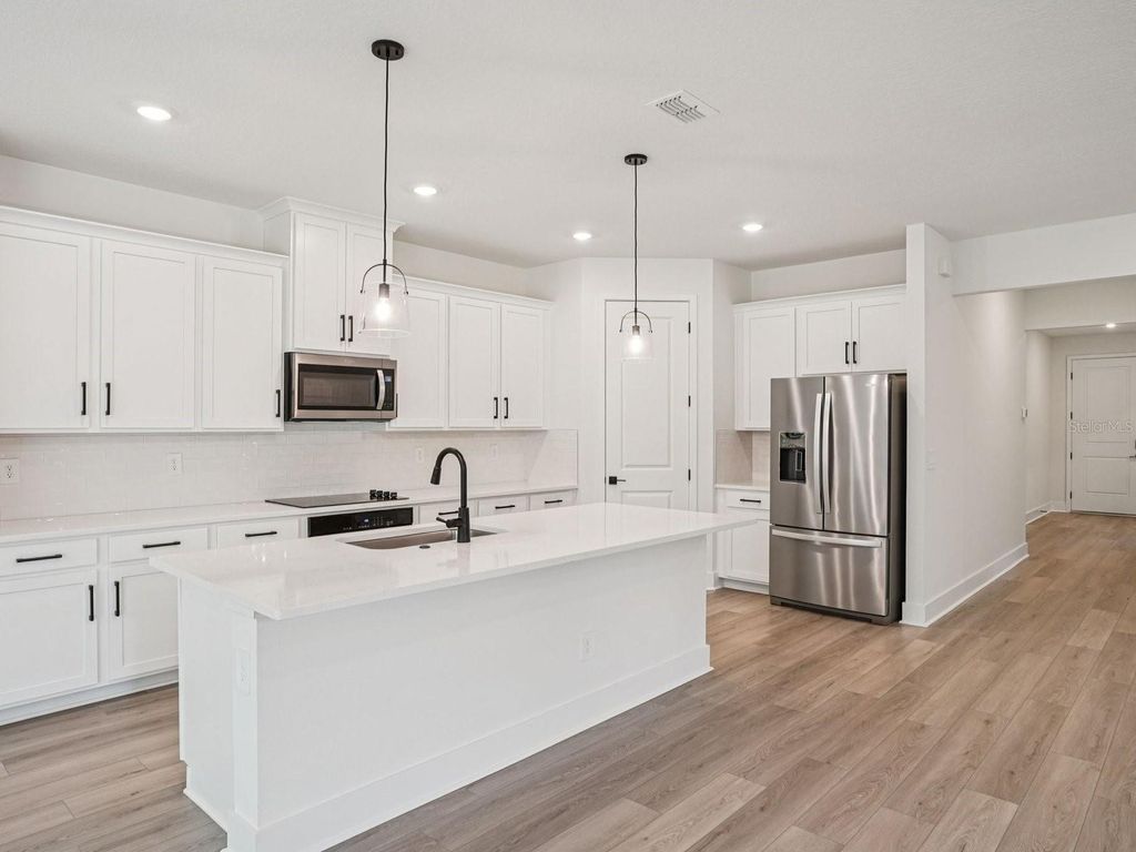 Photo of 584 Brookhaven Trail, Ormond Beach, FL 32174 (MLS # O6358163)