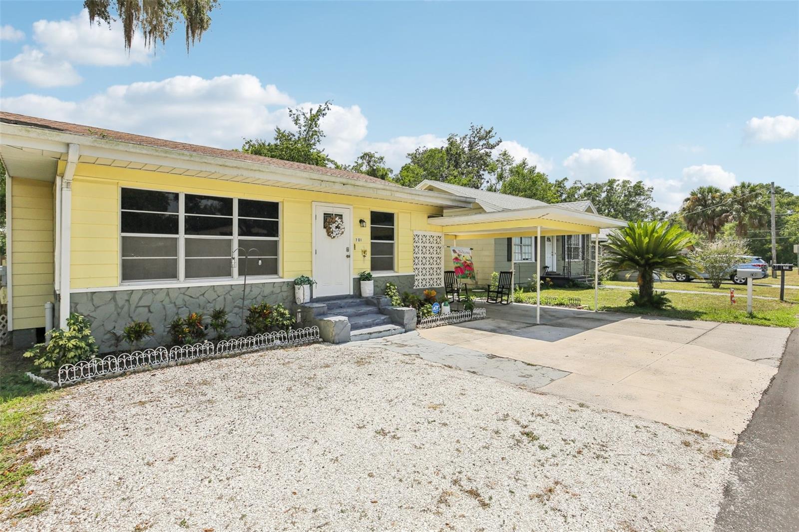 Charming, Fully Updated Home in Historic Downtown Plant City! Have you dreamed of living in the heart of quaint downtown Plant City? Love the character of older homes but not the hassle or expense of renovations? This beautifully updated 3-bedroom, 2-bathroom pool home offers the best of both worlds—classic charm with modern convenience, and it's truly move-in ready! Step into a spacious foyer with dual access from the front walkway and the covered carport. The open-concept layout flows seamlessly from the living area to the kitchen and dining space, creating a warm and welcoming atmosphere. The kitchen is a showstopper, featuring lots of cabinetry, gleaming granite countertops, and stainless steel appliances. Both bathrooms have been thoughtfully renovated with stylish tilework, updated vanities, and matching granite finishes. Neutral decorative accents throughout the home provide a perfect canvas for your personal touch. Outside, enjoy a fully fenced yard - complete with doggy access door, a sparkling pool, and two storage sheds for added convenience. Covered parking keeps you dry on rainy days, and recent updates—including newer windows and a 2022 A/C system & SOLAR Panels were just installed in 2024 for extremely low electric bills. Termite tented in 2024 with transferrable warranty offer even more peace of mind. Located just steps from the Plant City Historical District, local schools, parks, and the exciting new splash park coming soon! With no HOA and no deed restrictions, this home offers flexibility and freedom. Plus, it’s an easy commute to Brandon and the I-4 corridor. If you're looking for timeless character with modern updates, this downtown gem is a must-see!