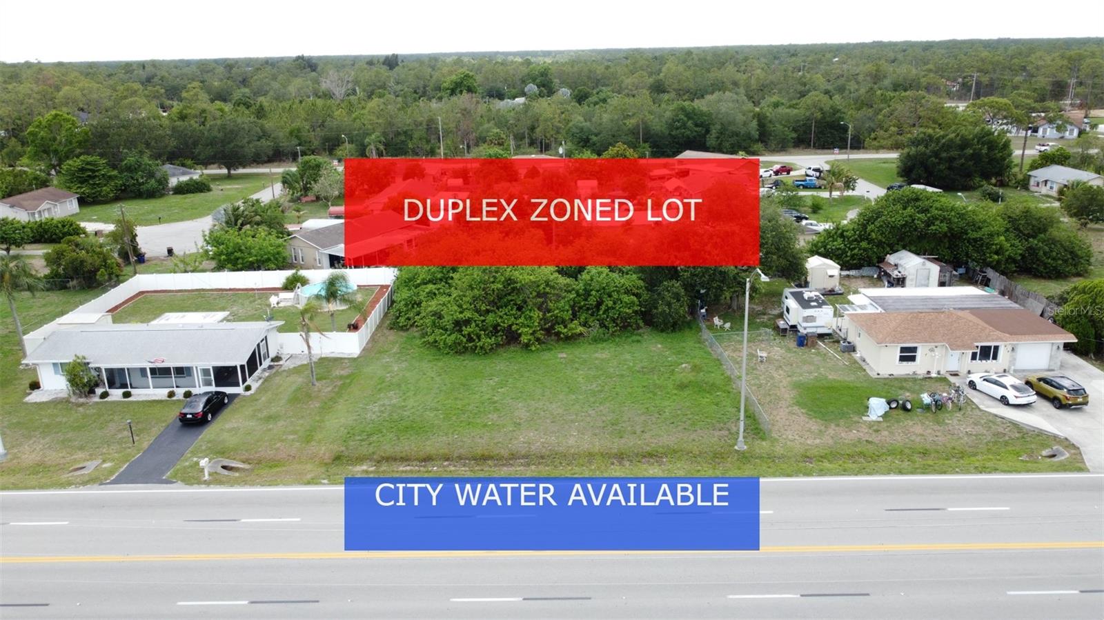 **DUPLEX ZONED LOT -- WITH CITY WATER!** Environmental report available showing this is an upland (no wetlands) with no turtles! Access to city water - very rare in Lehigh! This desirable duplex lot in a well established part of Lehigh Acres, right on Joel Blvd! Zoned for a duplex or single family home. Lot is already mostly cleared off with just some small trees/brush on the back side. Joel Blvd is a main road in Lehigh, so access throughout the city is easy and makes the location even more desirable. **Seller has other duplexes and single family home lots available in Lehigh** Not far to grocery stores, schools and other amenities. - Major airport just a quick drive away (RSW Southwest International Airport), as well as other adventures to explore: Fort Myers Beach, JetBlue Stadium (Home of the Red Sox spring training), Hammond Stadium (Home of the Twins spring training). Activities nearby include Lehigh Acres Community Park North; Lehigh Acres Trailhead Park; Lee County Manatee Park offering waterfront park providing paved trails, up-close views of manatees, an amphitheater & kayak rentals; Caloosahatchee Regional Park with sprawling, nearly 770-acre park featuring trails for mountain biking & hiking plus campsites & more. Not to mention the many beaches just West! SW Florida living is truly paradise!