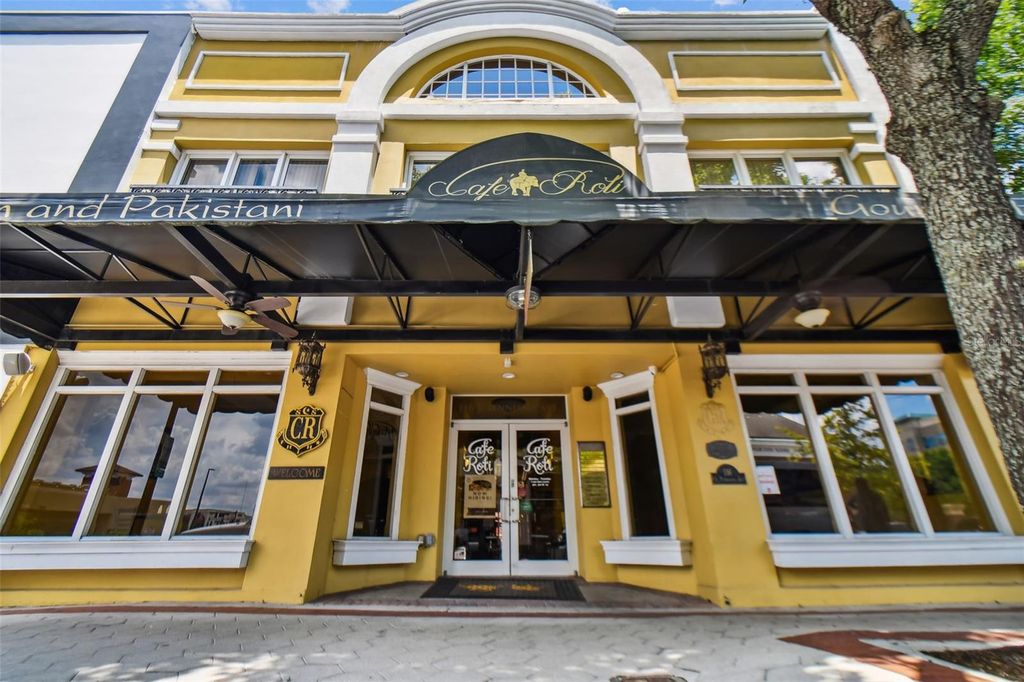 Photo of 116 S Tennessee Avenue, Lakeland, FL 33801 (MLS # TB8328623)