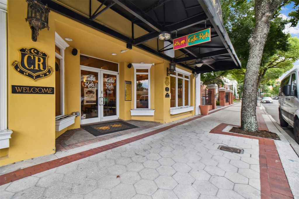 Photo of 116 S Tennessee Avenue, Lakeland, FL 33801 (MLS # TB8328623)