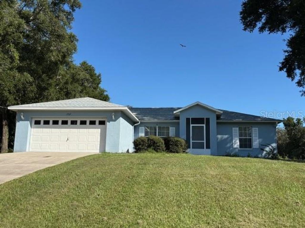 Photo of 1707 W Beach Plum Drive, Citrus Springs, FL 34434 (MLS # OM729229)