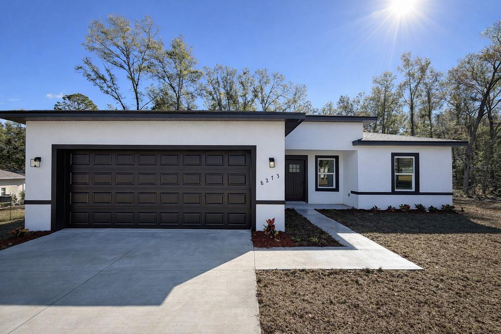 Photo of 8273 N Downer Way, Citrus Springs, FL 34434 (MLS # O6379369)