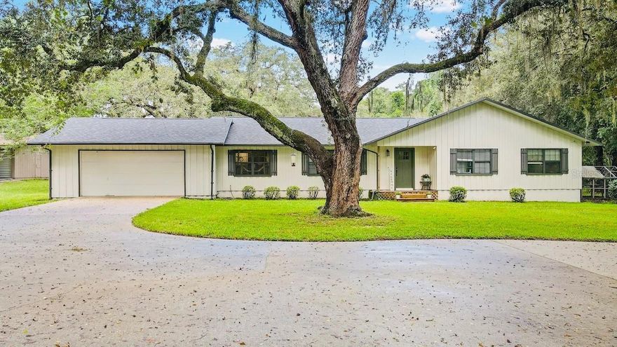 LOOKING FOR PRIVACY! Come see this unique 4BED 2BATH 2CAR POOL HOME with a detached 3car garage /workshop (24x36) on 4 ACRES(MOL).Recent updated features: A 16x30 Master Bed & 16x10 Master Bath- New Roof 2024- New A/C 2025- New flooring 2025. Open spacious floor plan with formal Dinning, living rm with fireplace and Breakfast nook- Brand New kitchen has lots of cabinet's and stainless appliances and leads out to the 36x13 enclosed SUN rm- The HUGE MASTER has beautiful walk n shower and freestanding tub along with a LRG walk n closet. OUTSIDE features: Beautiful 4 acres with Oak Trees- Pool and wood sun decks- Detached 3 car garage/workshop - Lots of parking for RV and boats on concrete- water softener system and iron breaker- fence and lots more.. Worth the look. The close proximity to I-75 and SR-589 gives easy access to Tampa.