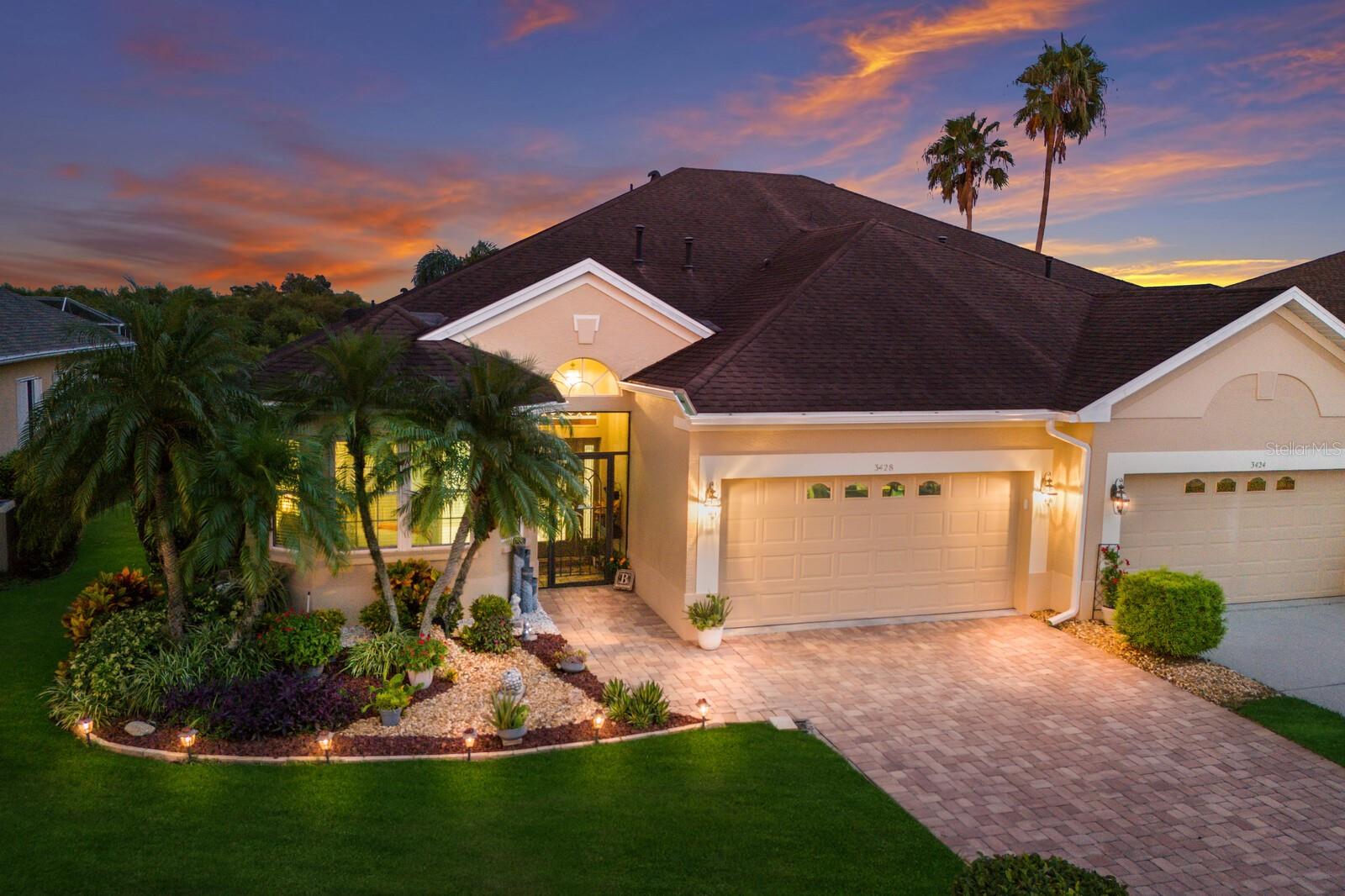 This home isn’t just move-in ready—it’s move-up ready. Spacious, upgraded, and designed to impress, this nearly 2,200 sq. ft. 2 bed / 2 bath villa lives more like a single-family home. The sought-after, maintenance-assisted community of Timberly offers you the very best of Parrish living with a prime location only minutes from the exciting new hub at Creekside Commons, placing dining, shopping, and community amenities at your fingertips. Relaxed sophistication is the hallmark of this unique split-bedroom residence which features a versatile den/flex space and a light, airy open floor plan that flows effortlessly from room to room. The true showstopper is the four-season lanai, reimagined as the ultimate great room—offering serene preserve views, exceptional privacy, and a front-row seat to nature’s beauty. A $44,000 renovation added all-new custom windows, new blinds, and an enhanced electrical system, creating a light-filled space ideal for both entertaining and quiet morning reflection. This distinctive room opens seamlessly to a peaceful garden hideaway with a second private screened lanai, designed to blur the lines between an indoor/outdoor lifestyle. The added space expands your options, creating an inviting setting to unwind or gather with friends while enjoying the coastal lifestyle year-round. Inside, refined upgrades elevate every detail—soaring tray ceilings with molding detail is accented with fresh pops of color to deliver a space that is both stylish and approachable. The modern eat-in kitchen blends premium granite with a chic, newly installed backsplash and sleek stainless appliances. The thoughtfully designed split-bedroom layout positions a guest bedroom and bath at the front while the master en-suite at the rear offers private lanai access, dual walk-in closets, split vanities and a luxurious whirlpool tub with separate shower. Adding versatility, a flex space with pocket doors can serve as a private home office or seamlessly extend the dining/living room area—keeping you connected while providing the option for privacy when needed. You can move in with confidence and peace of mind thanks to a host of premium upgrades—including a powerful 4-ton A/C with air purifier, a newer roof with skylight and roof vents, high-impact storm windows, freshly painted kitchen, office and guest room, custom paver driveway, and rich engineered hardwoods in the bedrooms and office—bringing comfort, style, and security all under one roof. Fresh, modern landscaping and new gutters have been added to enhance the home’s polished curb appeal. Beyond its welcoming neighborhood complete with a community pool, Timberly offers you unparalleled convenience with quick access to Ellenton Prime Outlets and I-75 for easy travel to Tampa and Sarasota airports and just minutes from the vibrant community of Lakewood Ranch. SW Florida's most pristine beaches and Sarasota’s vibrant downtown are in close proximity where residents can enjoy a wealth of recreational options paired with world-class culinary and cultural offerings. Your opportunity awaits to embrace the coastal lifestyle now by making your home in Parrish’s vibrant and thriving community, where small-town charm meets modern convenience and everyday feels like a Florida getaway! Call us today for your private showing!
