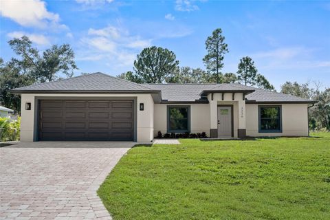 Photo of 3236 California Terrace, North Port, FL 34291 (MLS # A4669865)