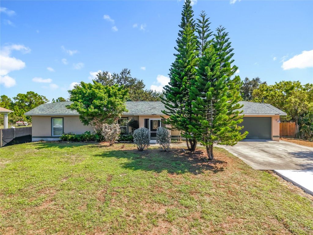 Photo of 814 Lincoln Avenue, Lehigh Acres, FL 33972 (MLS # TB8439232)