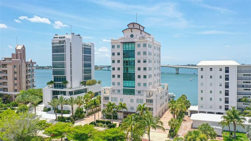 One or more photo(s) has been virtually staged. Behold a breathtaking panorama of the bay, the city skyline and magnificent sunsets through walls of glass from this stunning residence on Sarasota’s esteemed Golden Gate Point. Set in the intimate, boutique community of Majestic Bay, this 3BR/3.5BA plus office/den residence lives like a sprawling single-family waterfront home with more than 3,000 sq. ft., an entire floor of living space, a semi-private elevator and a private 2-car garage with new hurricane-impact door and epoxy flooring. Plus, your own deeded boat slip with 10,000 lbs. lift serves as your home port for nautical adventures along our region’s endless waterways. Fine features and appointments create an ambiance of elegance and style, from the new engineered hardwood floors to the upgraded lighting and fixtures casting upscale illumination throughout. Entertain with ease in the great room enhanced by your world-class backdrop and custom wet bar, all adjacent to the beautifully refreshed kitchen, with Viking Professional series appliances, Miele dishwasher, a workspace, breakfast nook, 4-burner gas range and striking granite countertops. The accommodations are both spacious and comfortable in a privacy-accentuating split plan, with the office/den boasting built-ins which could serve as a 4th bedroom. This list of updates is vast and exceptional, including the A/C and air purification system, ceiling fans, plumbing fixtures and more. Majestic Bay is a 10-unit pet-friendly complex caters to the downtown lifestyle with its chic and secure lobby, exclusive rooftop terrace, updated fitness center, social room, board/meeting room, catering kitchen and climate-controlled storage. Along with its remarkable amenities, living in Majestic Bay places you directly in the heart of all that makes Sarasota special, just moments from the dining, shopping and cultural attractions of the city and only a short drive from St. Armands and barrier island beaches. Some photos have been virtually staged. Room Feature: Linen Closet In Bath (Primary Bathroom).