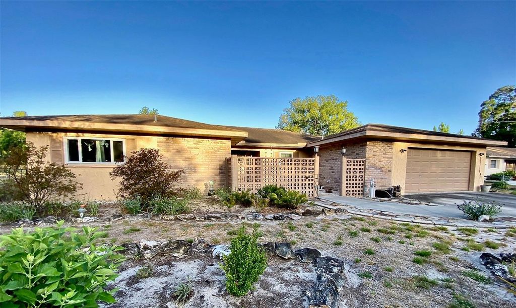 Photo of 12111 Scott Drive, Dade City, FL 33525 (MLS # TB8351227)