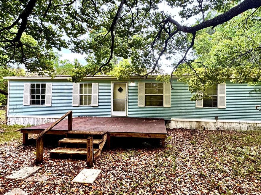 All we need is love… and this home could definitely use some love.
Opportunity awaits with this 1995 manufactured home situated on 1.4 acres of land. Offering 3 bedrooms, 2 bathrooms, and approximately 1,152 sq ft of living space, this property is ideal for investors, flippers, or buyers looking for a renovation project.
The home features a functional layout with split-bedroom design, but will require repairs and updates. Evidence of wear, including interior staining and deferred maintenance, is present. Property is being sold as-is and is priced accordingly.
Outside, the land gives you room to expand, garden, or simply enjoy the peace and quiet of country living.