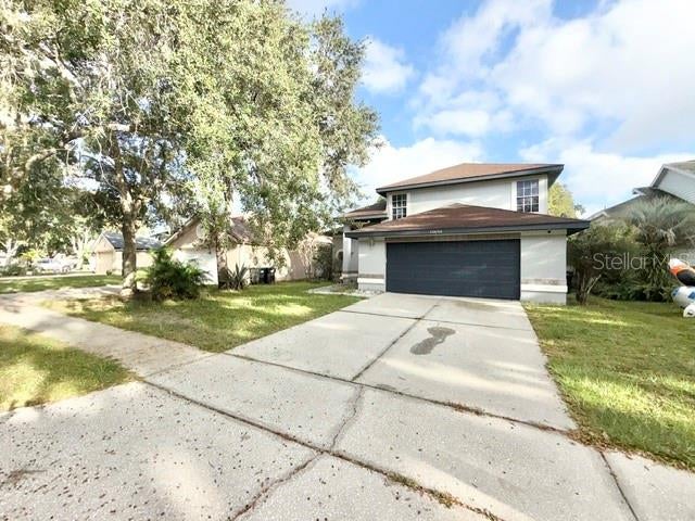 Photo of 10604 Satinwood Circle, Orlando, FL 32825 (MLS # O6453894)