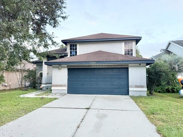 Photo of 10604 Satinwood Circle, Orlando, FL 32825 (MLS # O6453894)