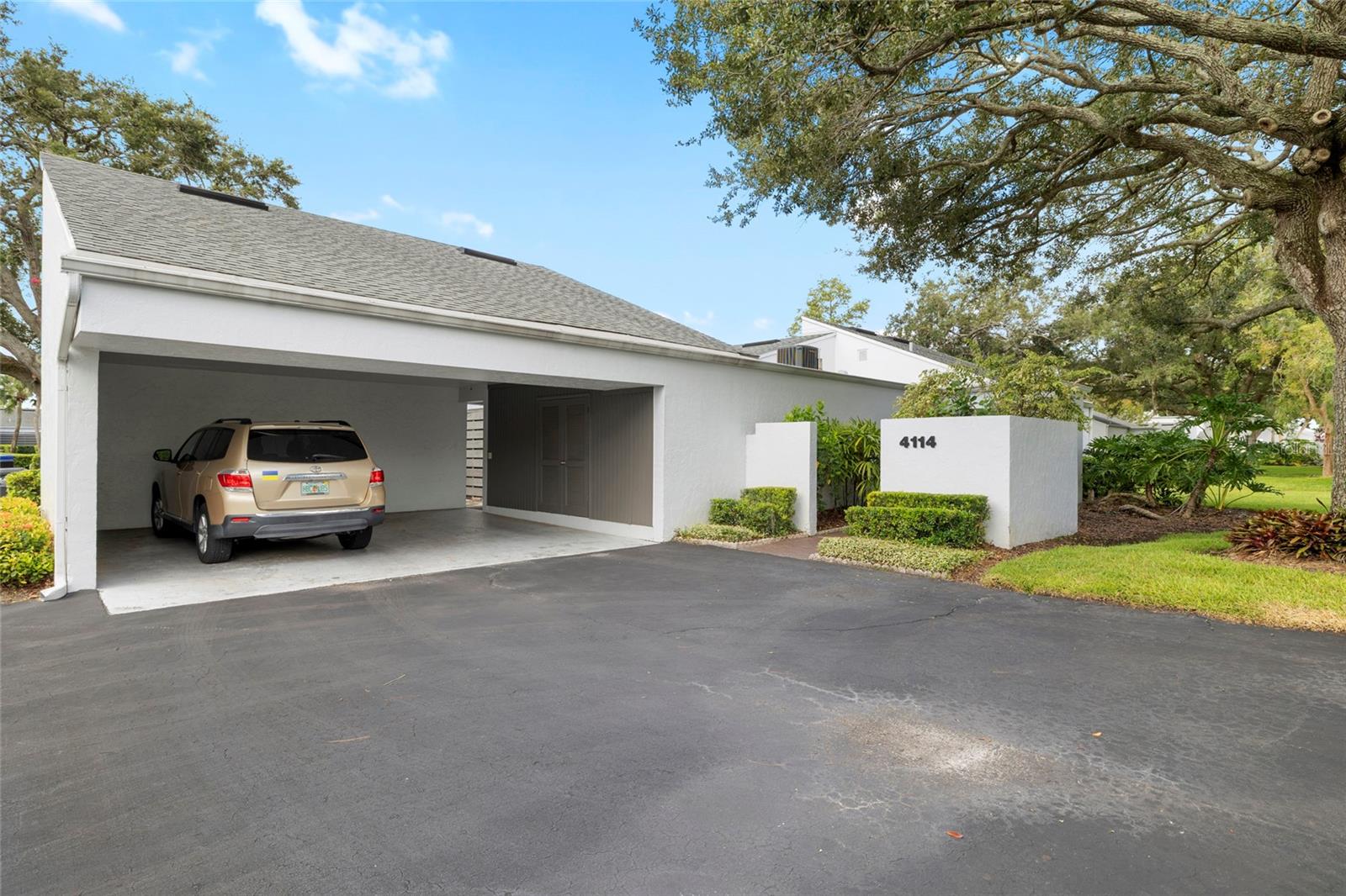 NEW LISTING in the Center of CARROLLWOOD VILLAGE 2/2 ONE STORY Condo/Villa. located in the beautifully maintained Northmeadow Clusters. Enjoy your own little gardening area as you enter this welcoming residence! It's the perfect floorplan with 2 bedrooms to the right and left with their own patios and bathrooms. 2 closets in the Primary. Plenty of living space to entertain in the GREAT room which wraps around to the perfect size Dining Room. The laundry closet is in the center of the home (convenient) and plenty of cabinetry in the Kitchen. 11 X 5 Storage closet off the Carport. The Northmeadow Cluster Houses is an established, and impeccably maintained village located near Carrollwood Golf Course. Easy walk to the private Country Club where you’ll find a state-of-the-art fitness center. Social, Golf, and Tennis memberships are available. There is a restaurant for fine and casual dining, an Olympic size swimming pool & tennis. Carrollwood Village itself has many amenities --parks, gardens, playgrounds, tennis, pickleball and basketball courts! Just 20 min to Tampa International, USF, Moffit, and approximately 25 minutes to Downtown! Enjoy shopping at a nearby Publix, Fresh Market, or Whole Foods! Nearby are abundant restaurant choices, entertainment, Carrollwood Cultural Center, and many boutiques. A walking neighborhood with miles of sidewalks, well-lit streets, and easy access to miles of pedestrian and cycling trails. ** All exterior maintenance and reserves for the roof, exterior paint, water, sewer, and Homeowners Insurance (Exterior Only) are included in the MONTHLY CONDO fee.