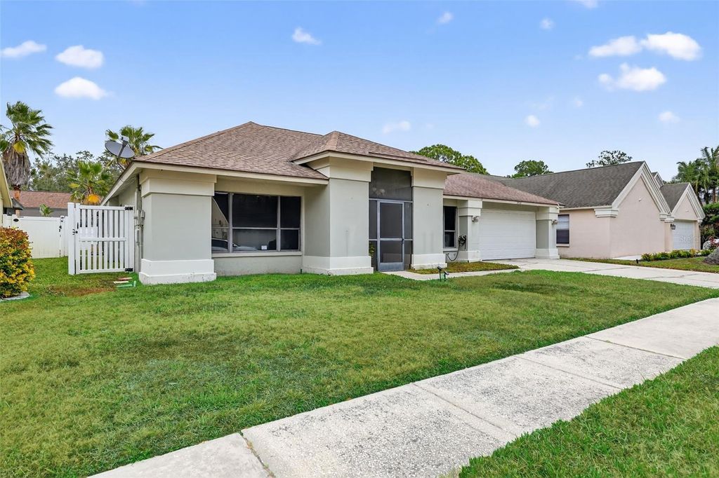 Photo of 9410 Pebble Glen Avenue, Tampa, FL 33647 (MLS # TB8469652)