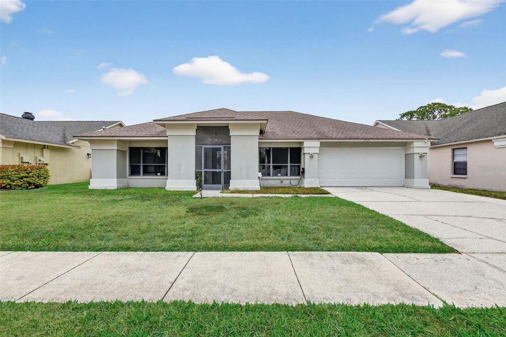 Photo of 9410 Pebble Glen Avenue, Tampa, FL 33647 (MLS # TB8469652)