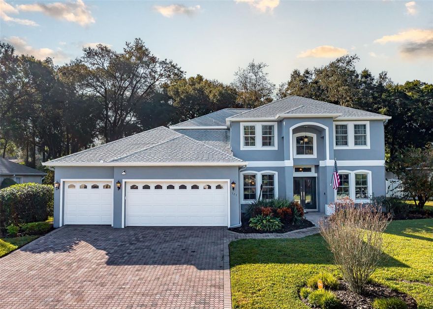 One or more photo(s) has been virtually staged. Welcome to this beautifully maintained home in the highly sought-after Rock Springs Ridge community, an established neighborhood thoughtfully planned around a scenic golf course. From the moment you enter, you’ll be greeted by an inviting open floor plan filled with natural light, creating a warm and elegant atmosphere throughout.
The spacious kitchen features an expansive eat-in bar perfect for casual dining, entertaining, or gathering with family and friends. Designed for comfort and convenience, the layout flows effortlessly into the living and dining areas.
Retreat to the luxurious primary bedroom, conveniently located on the first floor. This private suite boasts a spa-inspired bathroom with a large soaking tub, walk-in shower, dual sinks, and an added touch of sophistication with its bidet. It’s the perfect sanctuary to unwind and recharge at the end of the day.
Step outside to your own personal oasis. The screen-enclosed lanai is fully paved and showcases a sparkling pool, a propane-heated spa, and a well-appointed outdoor kitchen—a dream setting for year-round Florida living. Whether hosting gatherings or enjoying peaceful evenings at home, this space elevates outdoor living to a true luxury experience.
This home also offers exceptional upgrades for comfort, efficiency, and peace of mind:

• Tesla solar panels (2018)

• All new windows (2018)

• Full home water filtration system

• Upstairs bathroom shower remodel (2021)

• Interior paint (2022, excluding restrooms & closets)

• Exterior paint (2025)

• New water heater (2023)

• New plumbing (2023)
With its thoughtful updates, elegant features, and an unbeatable outdoor living experience, this home is a rare opportunity in Rock Springs Ridge.