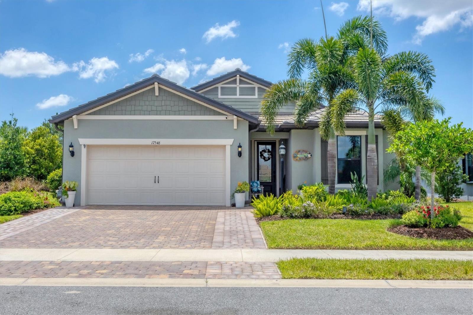 Welcome to Effortless Florida Living - This beautifully maintained ranch home with 2-bedroom plus den offers the perfect blend of comfort, functionality, and style, all nestled in the sought-after gated community of Del Webb Lakewood Ranch. From the moment you step inside, you're greeted by an open-concept floor plan bathed in abundant natural light, thoughtfully designed for both everyday living and effortless entertaining. The heart of the home is the spacious kitchen, featuring a large island, built-in oven, cooktop, and custom-designed pantry-ideal for the culinary enthusiast. A separate laundry room offers generous storage, while the split-bedroom layout ensures privacy and flexibility. The den, enclosed by elegant French doors, is perfect for a home office, reading nook, or guest space. The primary suite is a serene retreat, complete with a bright and airy atmosphere, dual sinks, a walk-in shower, private water closet, and a professionally designed walk-in closet offering thoughtful organization and luxurious function. Step outside to your screened lanai and take in the tranquil view of lush, mature landscaping - a true extension of your living space that invites you to relax, entertain, or simply soak in the beauty of nature. Additional features include: Air-conditioned garage with epoxy floors and abundant storage, Whole-house water filtration system,
Furnace with UV light for enhanced air quality, Retractable screen door at the front entry. Impeccably maintained and truly move-in ready.
If you're looking for easy living, thoughtful design, and a home that reflects pride of ownership this is the one! This home is located within a vibrant, resort-style 55+ community offering everything from a stunning clubhouse and full-service restaurant to tennis, pickleball, bocce, fitness center, pool, walking trails, and a dog park creating endless opportunities to connect, play, relax, and dine. This is more than a home, it’s a lifestyle. Come enjoy the peace, privacy, connection, activities and convenience of Del Webb Lakewood Ranch, where every day feels like a getaway.