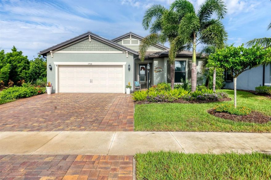 Welcome to Effortless Florida Living - This beautifully maintained ranch home features 2-bedroom|2-bath|Flex Room offering the perfect blend of comfort, functionality, and style, all nestled in the sought-after gated community of  Del Webb Lakewood Ranch. From the moment you step inside the Mystique floor plan - you are greeted by an open concept boasting an abundance of natural light, thoughtfully designed for both everyday living and effortless entertaining. The heart of the home is the spacious kitchen, featuring a large island, built-in oven, cooktop, and custom-designed pantry-ideal for the culinary enthusiast. A separate laundry room offers generous storage, while the split-bedroom layout ensures privacy and flexibility. The flex room, enclosed by elegant French doors, is perfect for a home office, reading nook, or guest space. The primary suite is a serene retreat, complete with a bright and airy atmosphere, dual sinks, a walk-in shower, private water closet, and a professionally designed walk-in closet offering thoughtful organization and luxurious function. Step outside to your screened lanai and take in the tranquil view of lush, mature landscaping - a true extension of your living space that invites you to relax, entertain, or simply soak in the beauty of nature. Additional features include: Air-conditioned garage with epoxy floors and abundant storage, Whole-house water filtration system,
Furnace with UV light for enhanced air quality, Retractable screen door at the front entry. Impeccably maintained and truly move-in ready. 
If you're looking for easy living, thoughtful design, and a home that reflects pride of ownership this is the one! This home is located within a vibrant, resort-style 55+ community offering everything from a stunning clubhouse and full-service restaurant to tennis, pickleball, bocce, fitness center, pool, walking trails, and a dog park creating endless opportunities to connect, play, relax, and dine. This is more than a home, it’s a lifestyle. Come enjoy the peace, privacy, connection, activities and convenience of Del Webb Lakewood Ranch, where every day feels like a getaway. Mystique floor-plan. Driveway recently resealed.