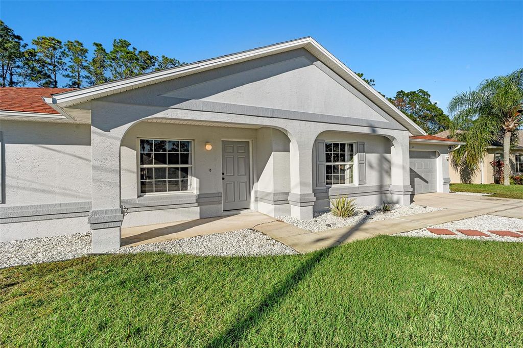 Photo of 21 Rainbrook Drive, Palm Coast, FL 32164 (MLS # FC314764)