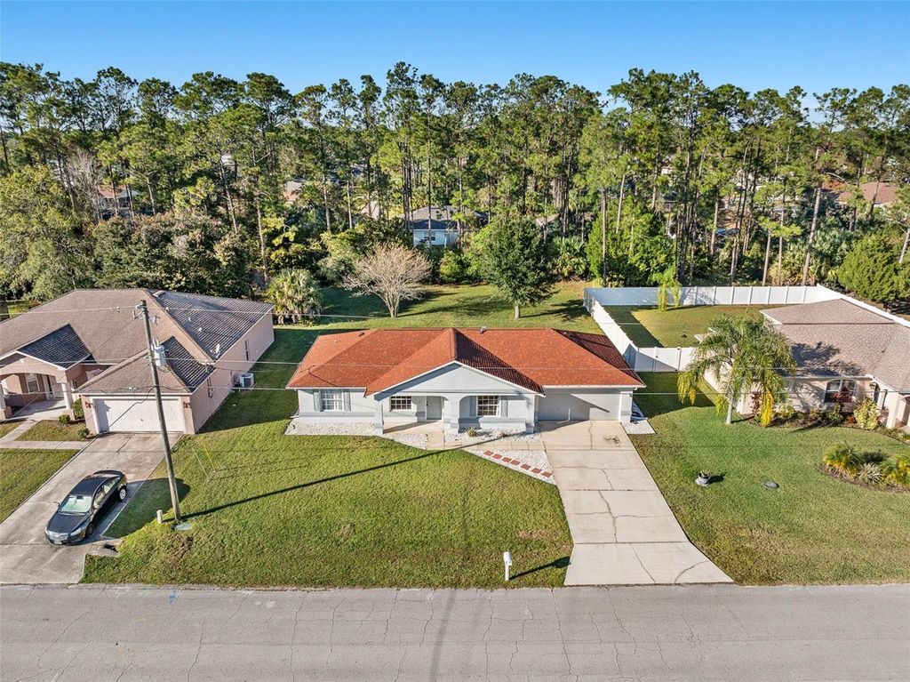 Photo of 21 Rainbrook Drive, Palm Coast, FL 32164 (MLS # FC314764)