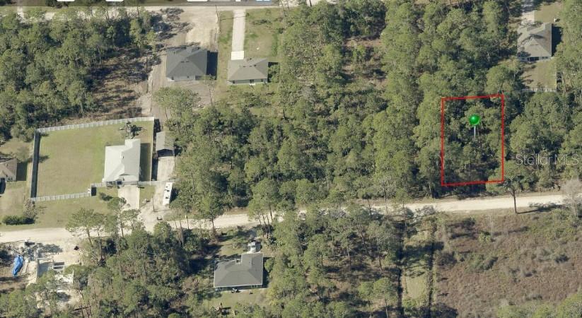 Vacant residential lot in Daytona Park Estates, Deland, FL. Spacious and tranquil location. Serene neighborhood with mature trees. Close to Orlando and Daytona Beach with convenient access to I4. Embrace the opportunity to create your dream home in this sought-after community. Lots of new construction in the area. Ideal for custom home construction. Property may be eligible for financing with preferred lender's Lot Loan program- unimproved and improved land.
*****BONUS – THIS PARCEL CAN BE BOUGHT (purchasing both separately as they are deeded two separate owners) WITH THE ADJACENT LAND LISTING MLS #O6157837 as I am working with this listing agent to do so. THE COUNTY WILL ALLOW YOU TO MERGE THESE TWO PARCELS TOGETHER TO CREATE ONE HOMESTEAD. Contact me for details.*****