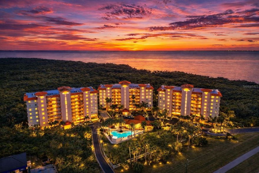 A Rare Estuary Retreat in the Heart of Tampa Bay.
Live where nature, light, and coastal serenity converge at Grande Verandahs on the Bay. Nestled within a Tampa Bay estuary setting, this beautifully updated residence offers a lifestyle that feels both peaceful and inspiring. Sunsets paint the sky each evening, while lush preserve surroundings and gentle bay breezes create a sense of retreat rarely found in such a convenient location.
Sidewalks along the bay invite morning walks or sunset jogs, and Weeden Island Preserve just across the street offers endless opportunities for kayaking, nature trails, and wildlife exploration — truly a bird and nature lover’s paradise.
Spanning 2,187 square feet, the home’s spacious layout is enhanced by 9'4" ceilings and oversized hurricane-compliant windows and sliding glass doors that flood the interior with natural light. The updated kitchen and baths showcase designer quartz countertops, elegant hardware, and new appliances, blending modern style with everyday comfort.
Custom fluted accent walls throughout the home add architectural warmth and character, while modern barn doors elevate the split-bedroom layout.
The primary suite offers a private retreat featuring two walk-in closets and a beautifully appointed bath complete with a relaxing soaker tub.
An oversized private balcony extends the living space outdoors — the perfect setting for morning coffee or evening wine while enjoying sunsets sparkling through the trees with a gentle sea breeze.
The residence includes two secure garage parking spaces, one equipped with an electric vehicle charging station, and offers convenient proximity to the elevators. Residents also benefit from controlled elevator access with private code entry, providing an added layer of security.
Grande Verandahs on the Bay is a gated community known for its peaceful atmosphere and desirable amenities, including a pool, fitness center, clubhouse, and dog-friendly environment with a dedicated dog park.
Exciting growth continues nearby with a new marina being developed across the street, planned to feature boat slips and public dry dock facilities, along with the Waterways Luxury Apartment community.
Ideally positioned between downtown St. Petersburg and downtown Tampa, with easy access to Hyde Park, marinas, dining, entertainment, St. Pete–Clearwater International Airport, and Tampa International Airport.  HOA fees include hazard insurance, flood insurance, water, trash, and maintenance of the pool and common areas. Association financial and reserve information is available for buyer review. Buyer and buyer’s agent to verify all measurements, HOA information, fees, reserves, restrictions, and coverage details.