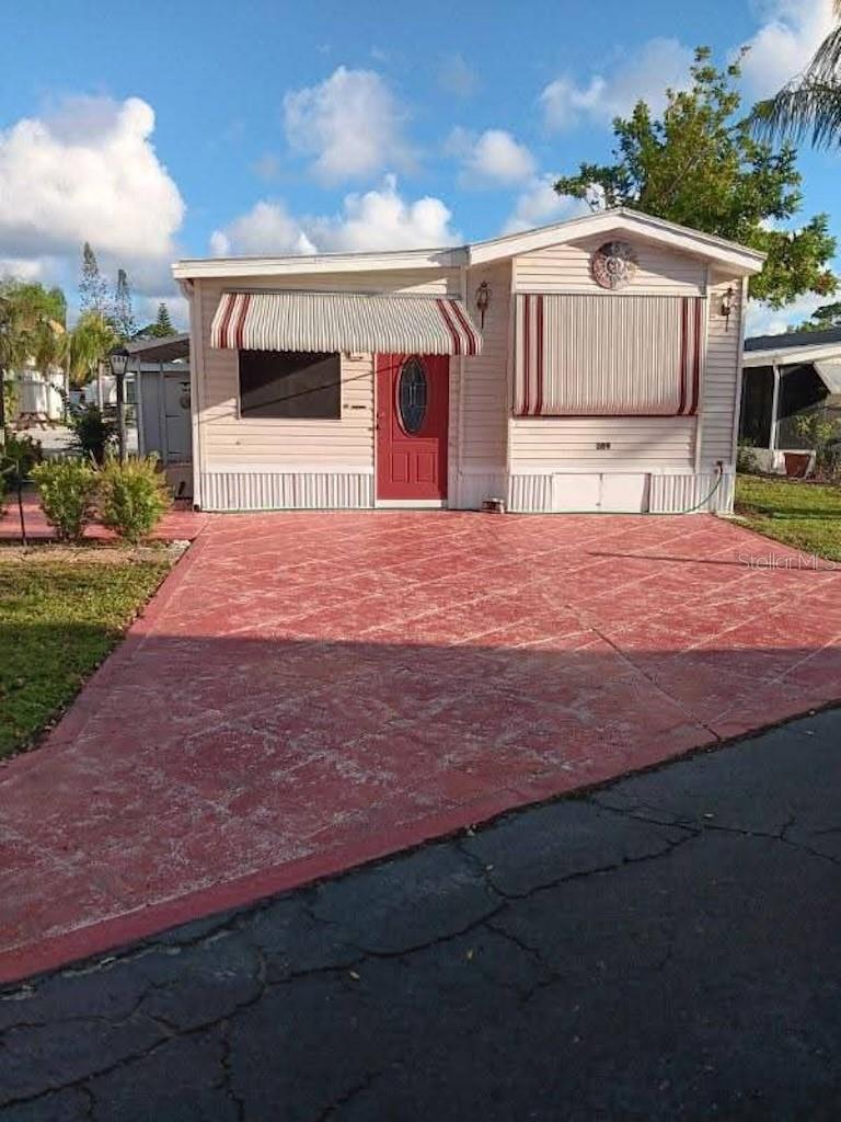 Located in Sarasota Lakes resort. This gated community offers many amenities including swimming, tennis, shuffle board, pickle ball and a playground. This home offers 1 bedroom, 1 full bath, spacious living room and more. Large side patio and storage shed. Entrance on both side of home. On site management. Great location, near airport, close to beaches downtown and St. Armand Circle.