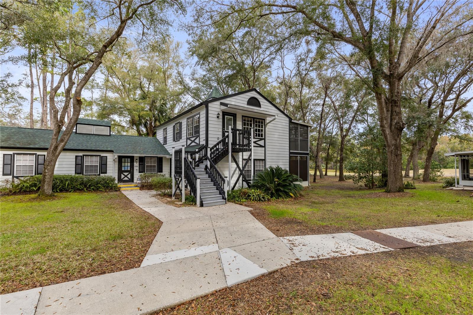Welcome to this charming 2-bed, 2-bath condo in the desirable 55+ Derby Downs golf community. Built in 1987 and partially renovated, this 840 sq ft unit offers peaceful golf course views from the private back porch. Features include vinyl flooring, an open living/dining area, solid wood cabinets, in-unit laundry, and an en suite primary bedroom. HOA covers roof, exterior, landscaping, pest control & trash—low-maintenance living in a scenic, active community!