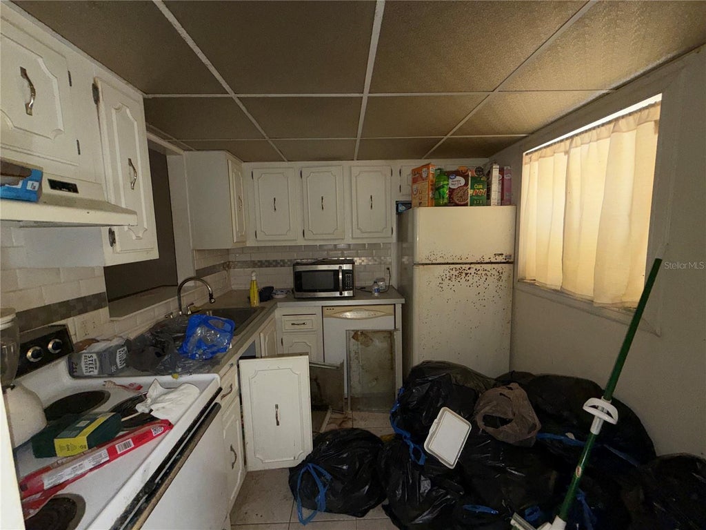 Photo of 11485 Oakhurst Road #200-108, Largo, FL 33774 (MLS # TB8562734)
