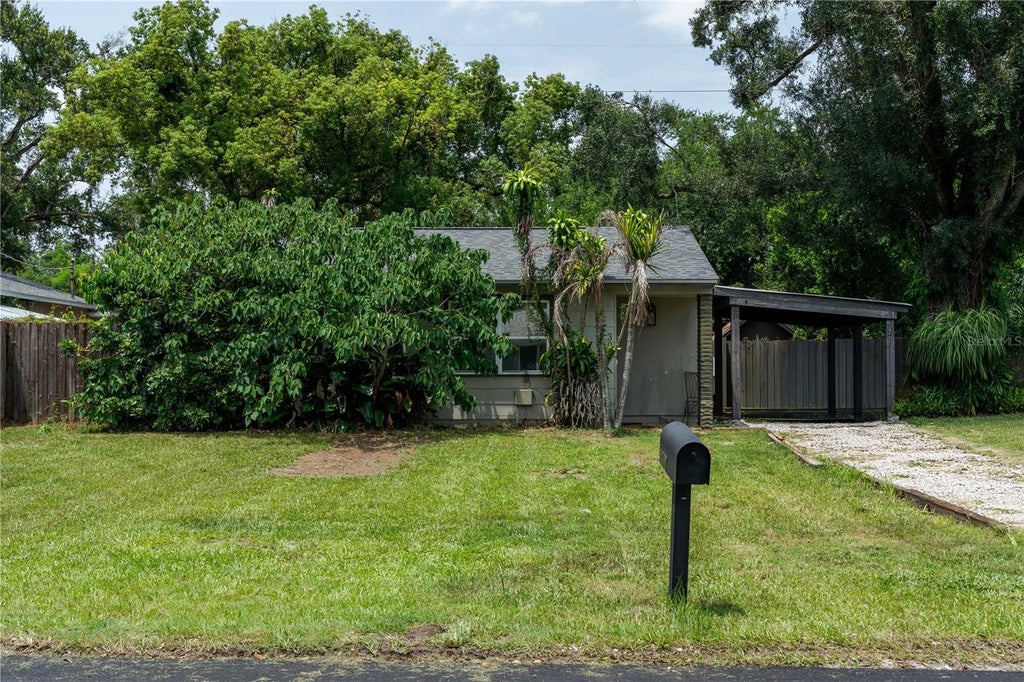Photo of 304 E Hydrangia Street, Tampa, FL 33612 (MLS # TB8533545)