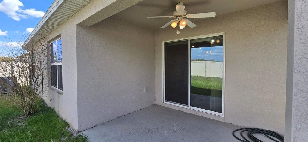 Photo of 8557 Triumph Circle, Wildwood, FL 34785 (MLS # OM721594)