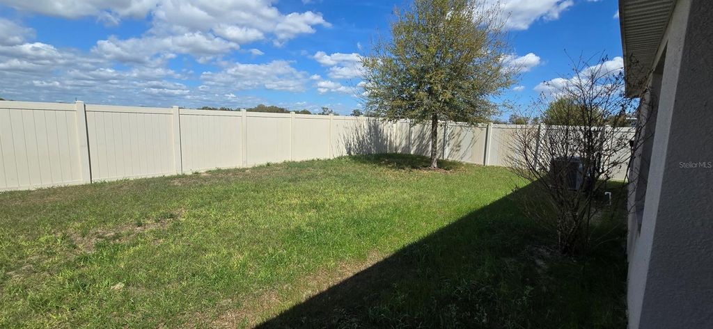 Photo of 8557 Triumph Circle, Wildwood, FL 34785 (MLS # OM721594)